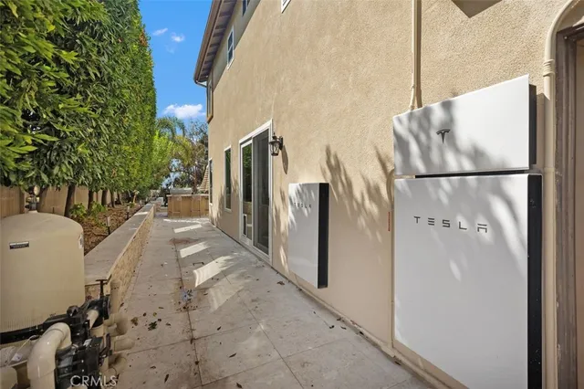 an aerial view of multiple houses with yard