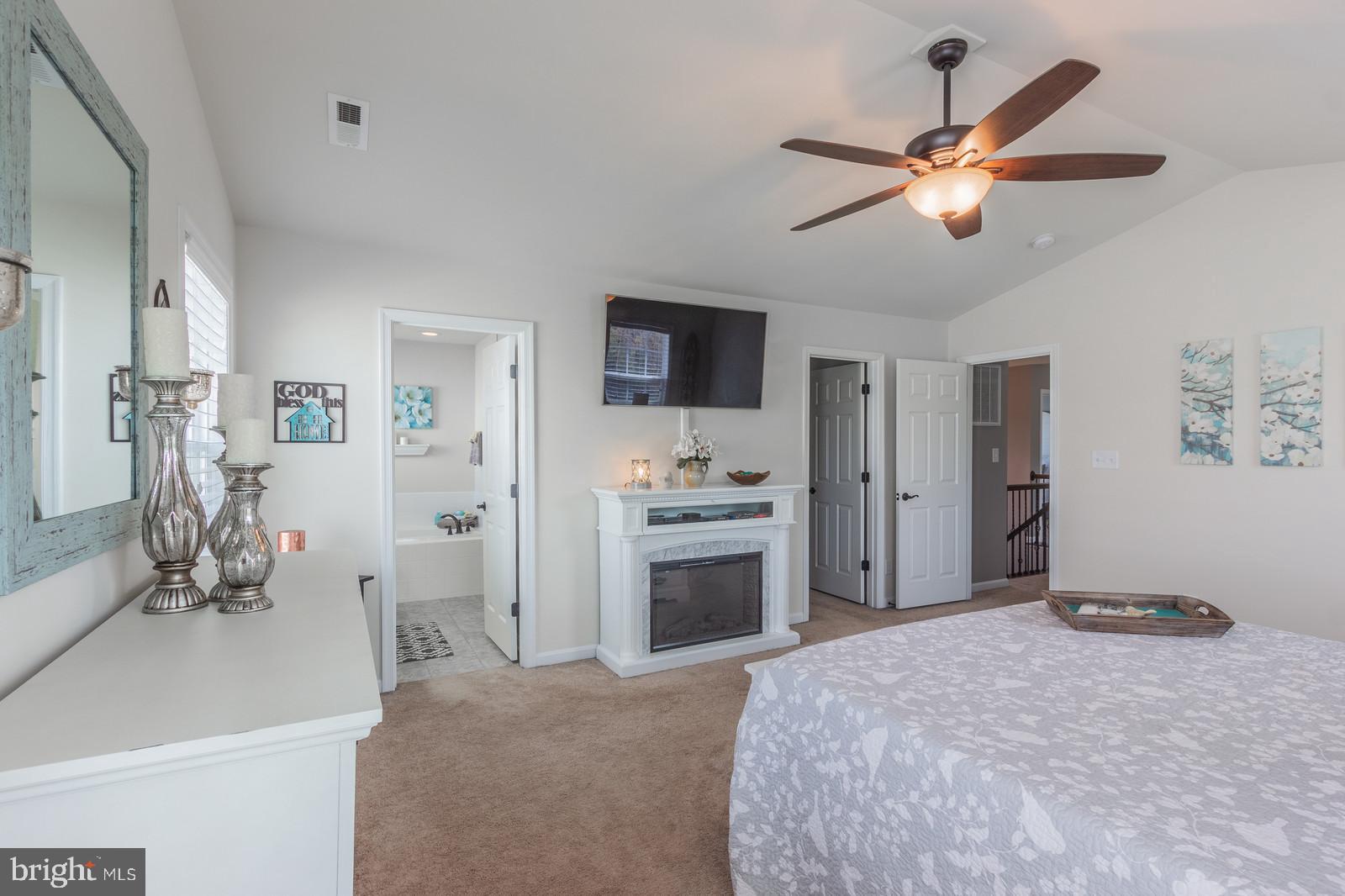 5282 Longbow Road King George, VA 22485 - Photo 27 of 48 Master Bedroom With Fireplace & Master Bathroom