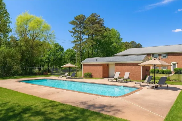 a view of outdoor space yard deck and swimming pool