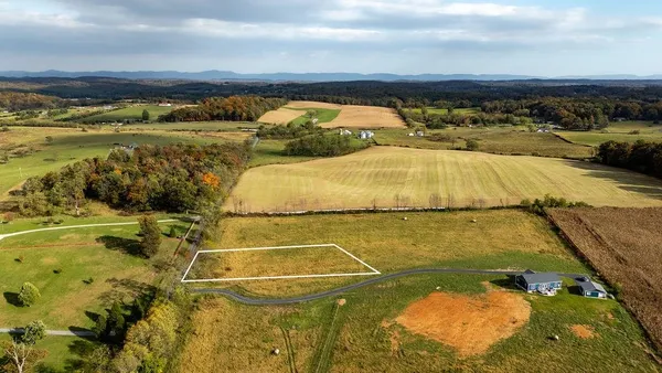 a view of an ocean and a mountain