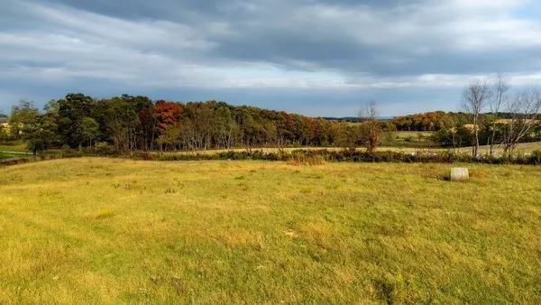 a view of swimming pool with mountain in the background