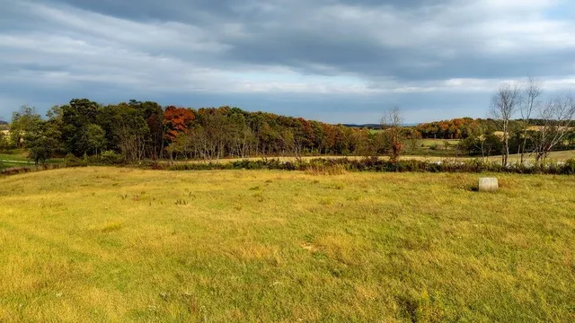 a view of swimming pool with mountain in the background