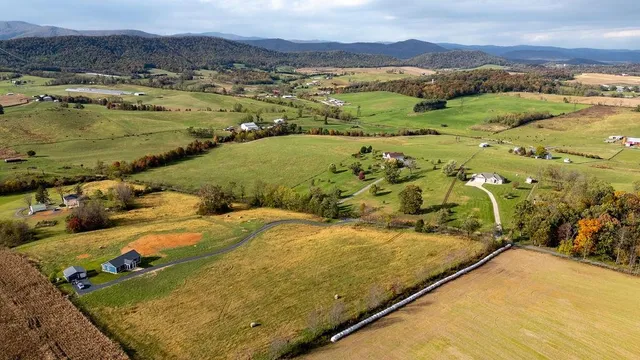a view of an ocean from a mountain
