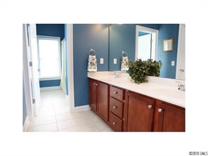 808 Victorian Way Fort Mill, SC 29708 - Photo 14 of 16 a bathroom with a sink double vanity and a mirror