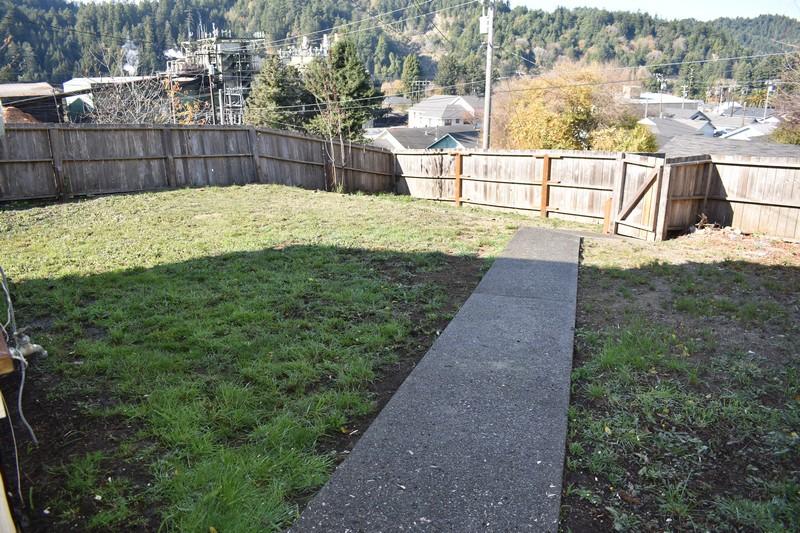 648 3rd Street Scotia, CA 95565 - Photo 9 of 10 back yard and walkway