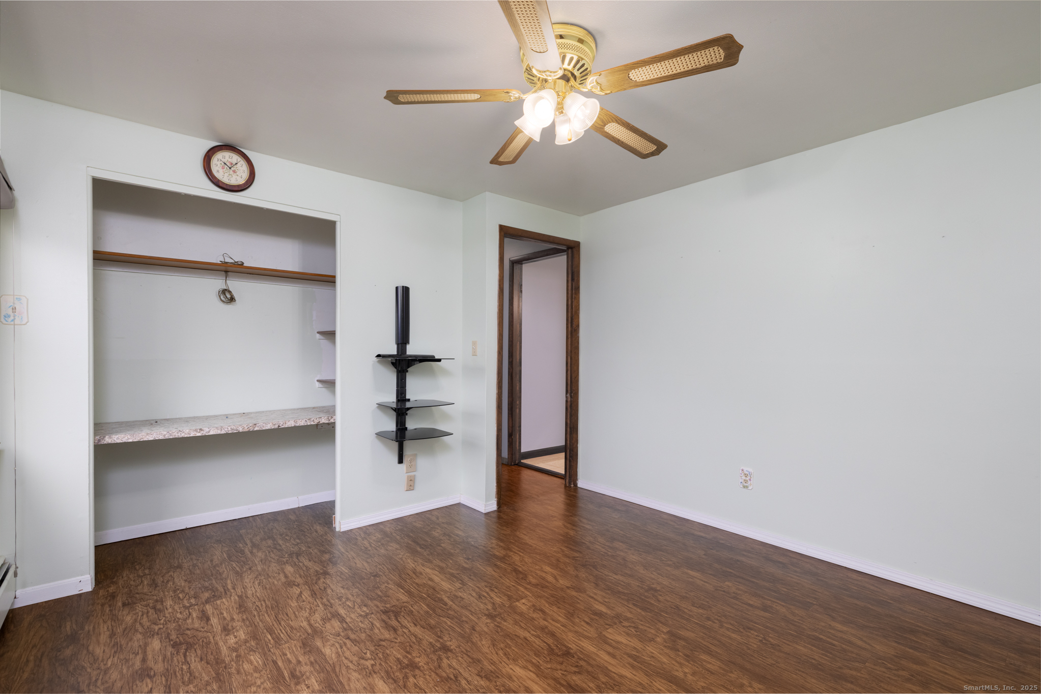 93 Tawny Thrush Road Naugatuck, CT 06770 - Photo 11 of 33 a view of empty room with wooden floor
