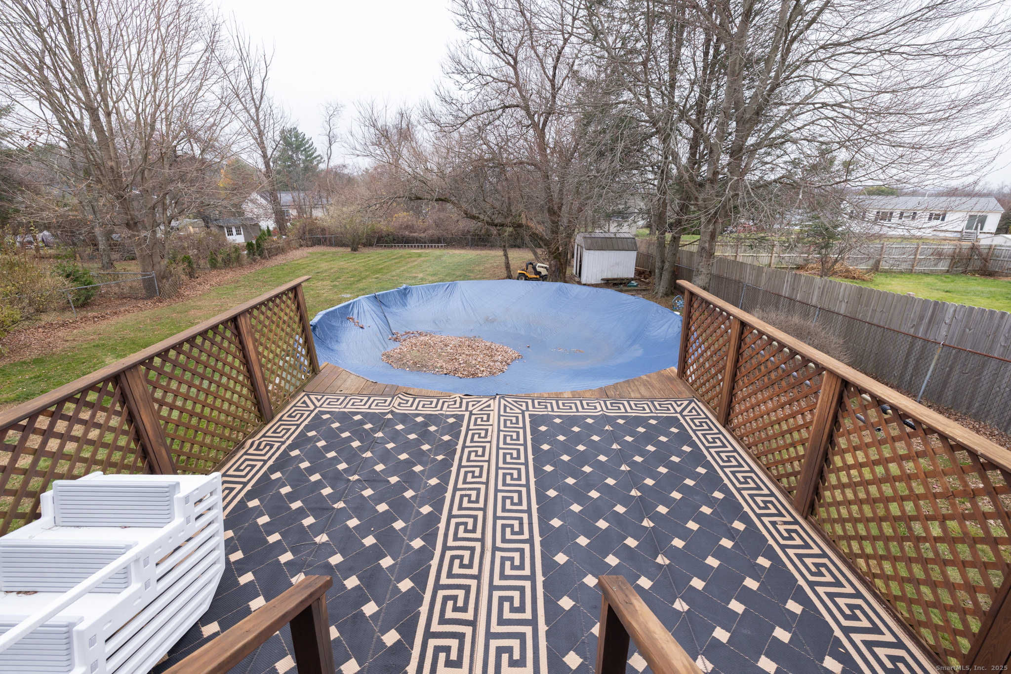 93 Tawny Thrush Road Naugatuck, CT 06770 - Photo 17 of 33 a view of balcony with wooden floor