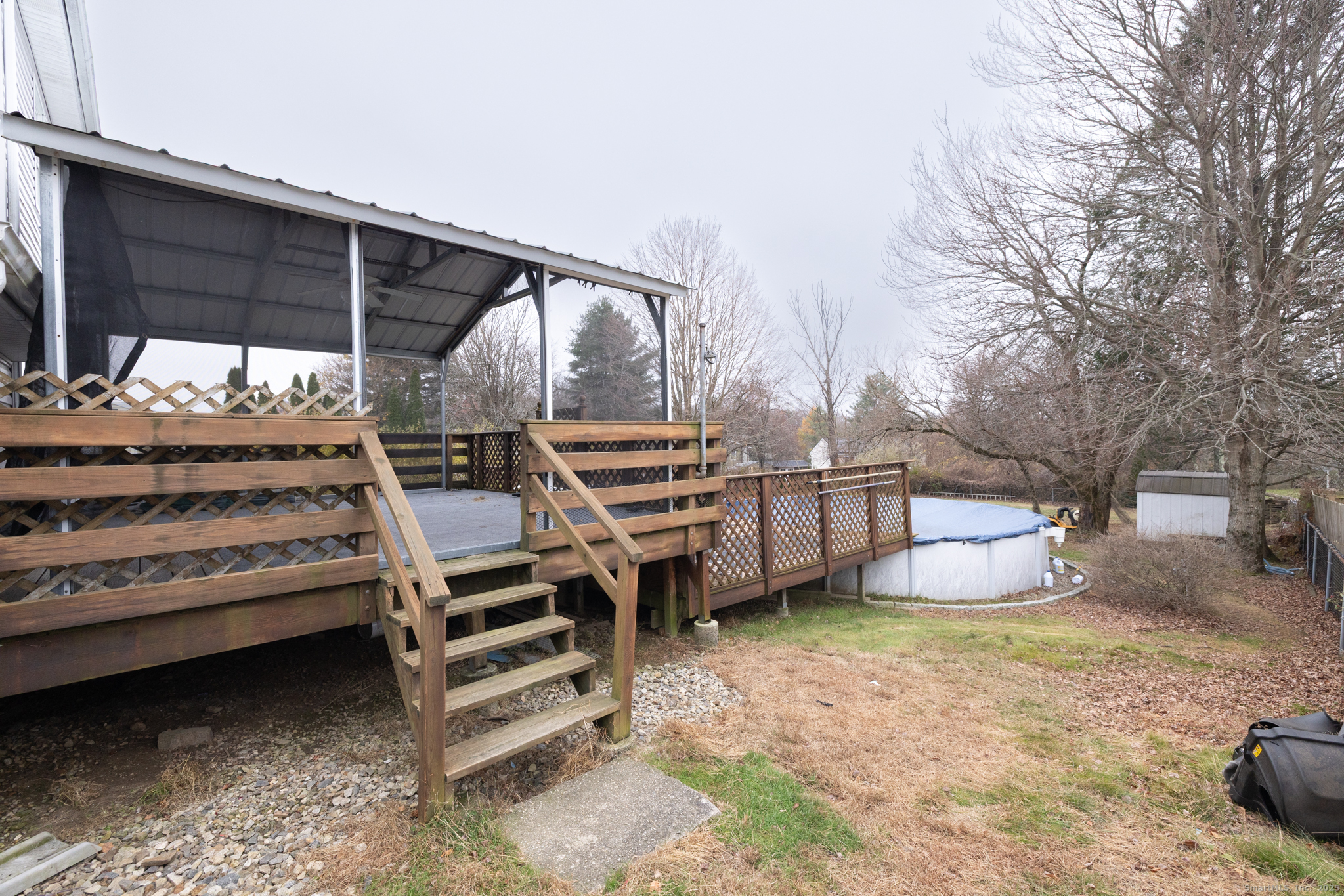 93 Tawny Thrush Road Naugatuck, CT 06770 - Photo 30 of 33 a view of a backyard with sitting area
