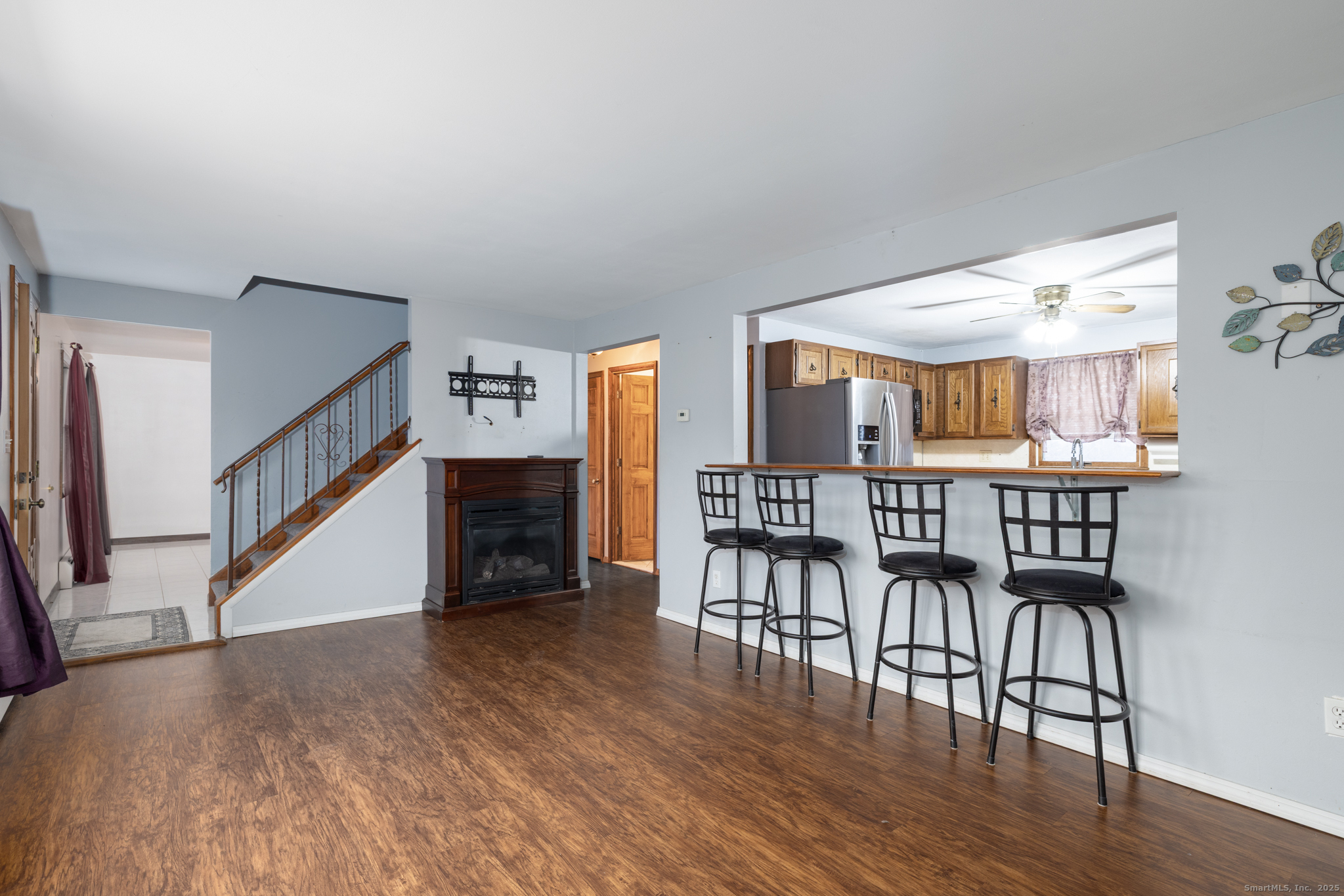 93 Tawny Thrush Road Naugatuck, CT 06770 - Photo 7 of 33 a dining room with furniture and wooden floor