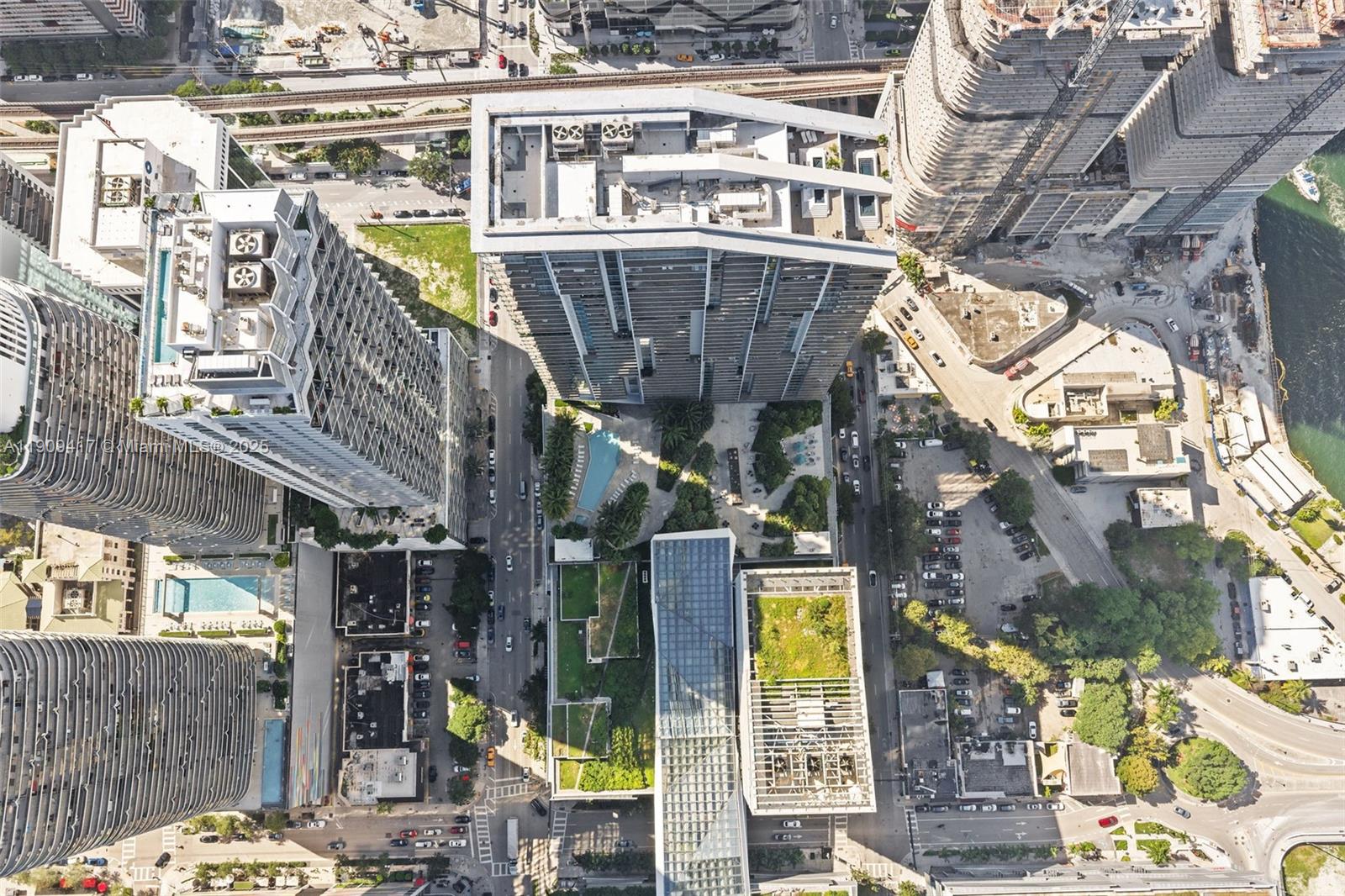 88 Southwest 7th Street, Unit 3101 Miami, FL 33130 - Photo 30 of 35 a building with multiple trees