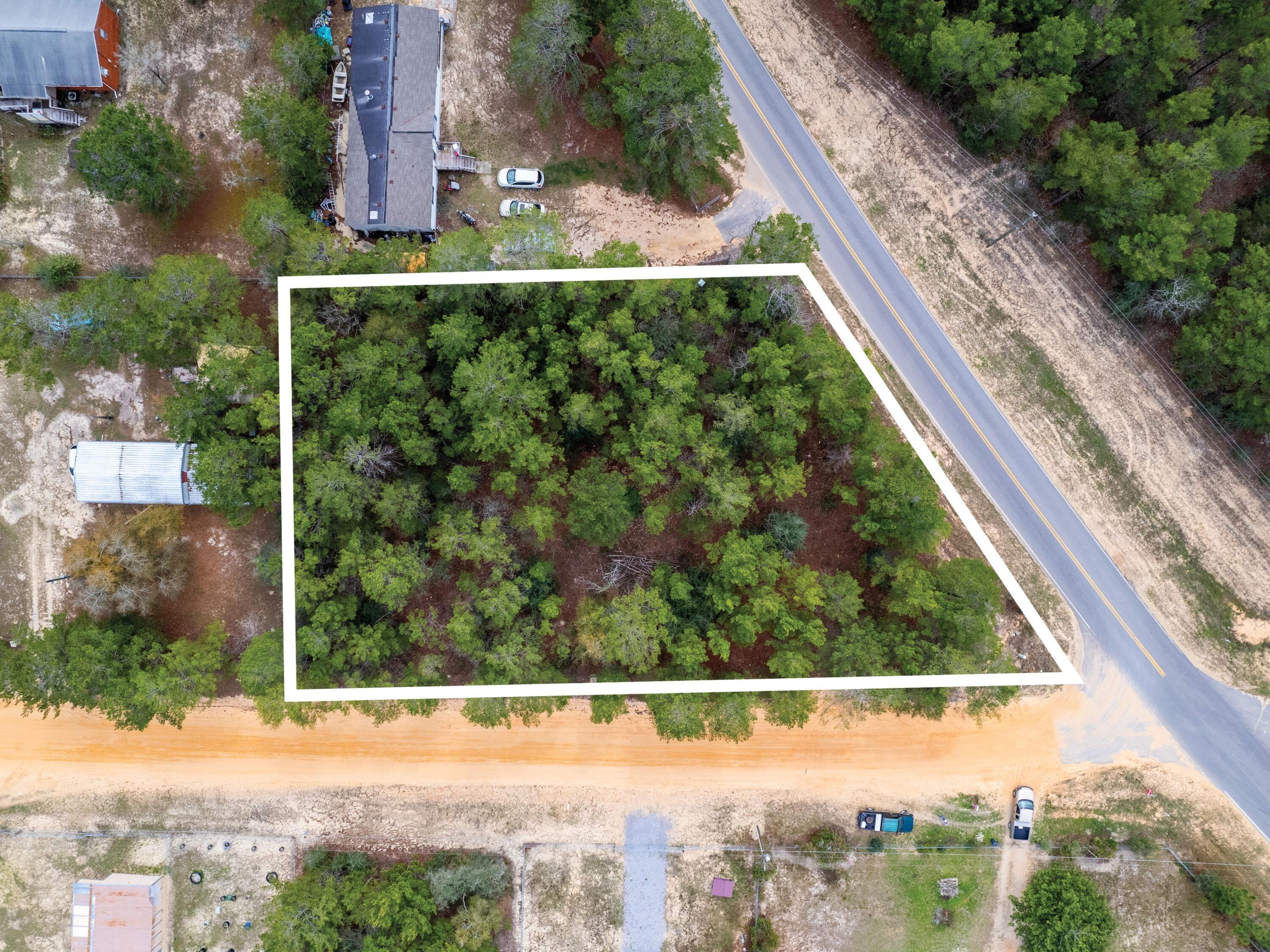 1-2 Girl Scout Road DeFuniak Springs, FL 32433 - Photo 5 of 13 a view of a garden from a balcony