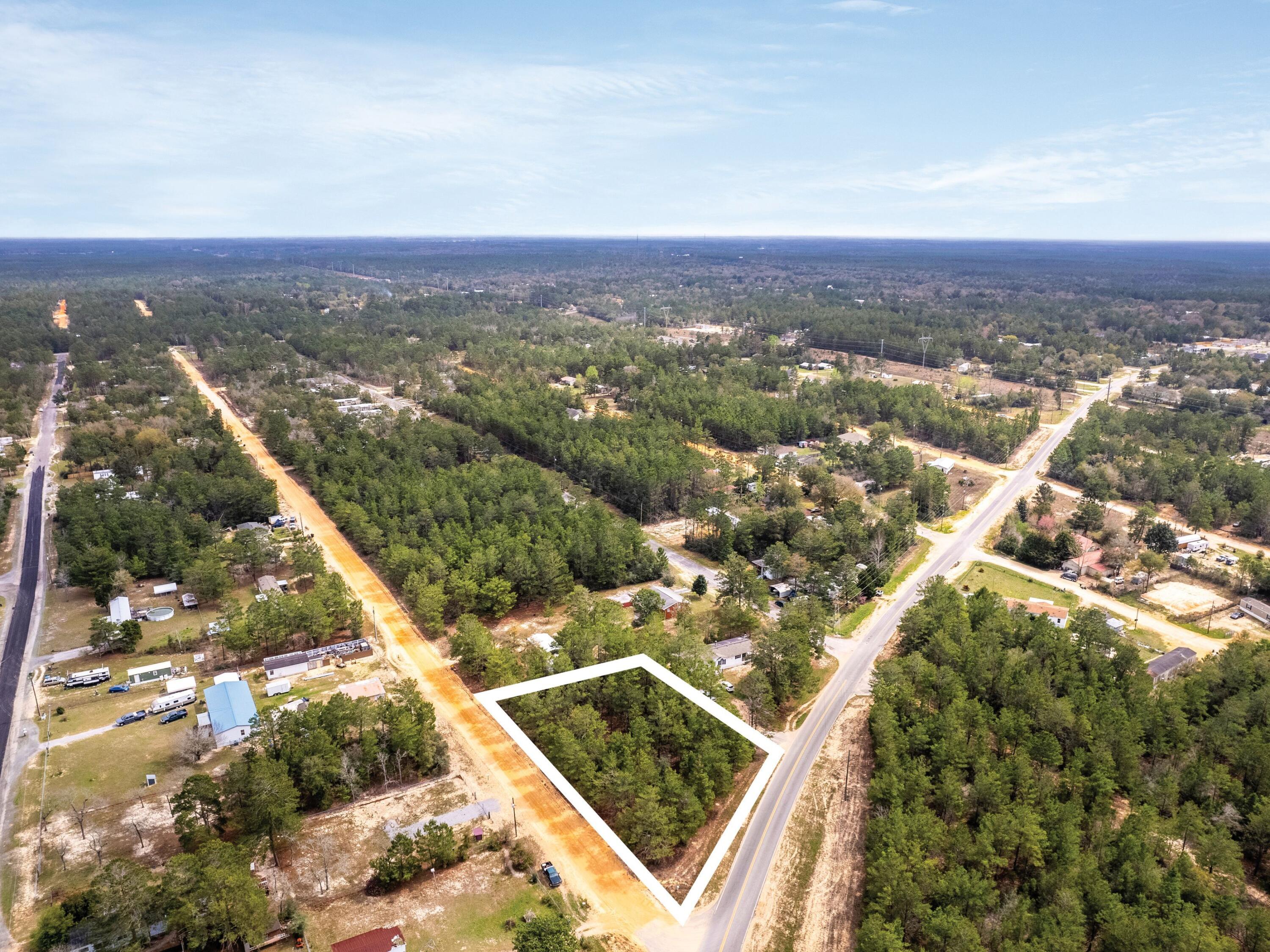 1-2 Girl Scout Road DeFuniak Springs, FL 32433 - Photo 6 of 13 an aerial view of residential houses with city view