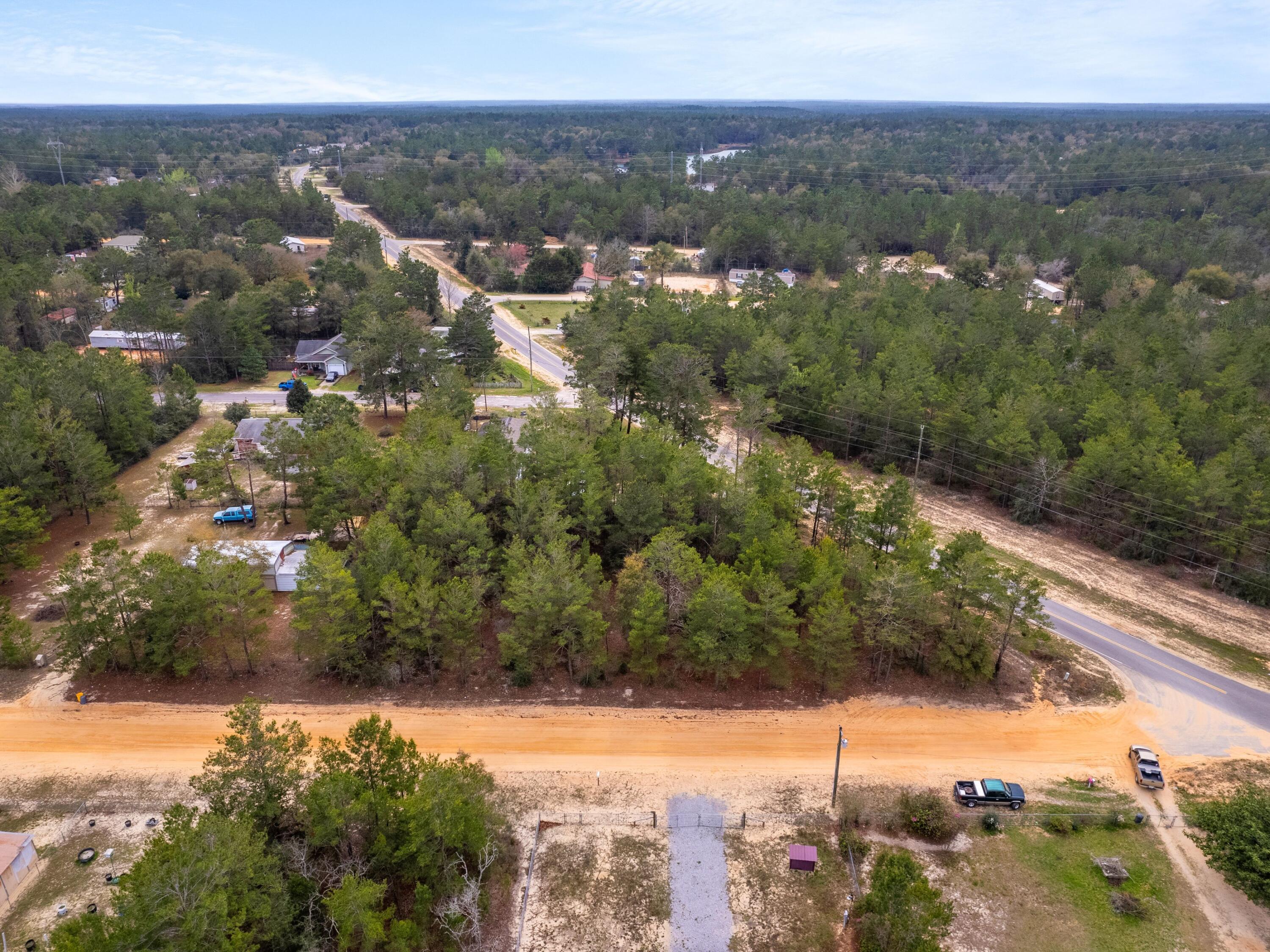 1-2 Girl Scout Road DeFuniak Springs, FL 32433 - Photo 8 of 13 an aerial view of multiple house