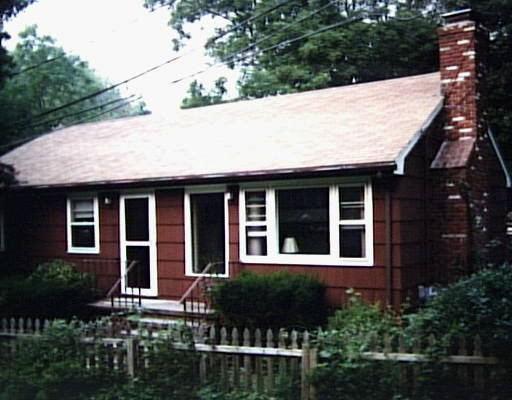 12 Wakeman Road Fairfield, CT 06824 - Photo 1 of 1 a house view with a garden space