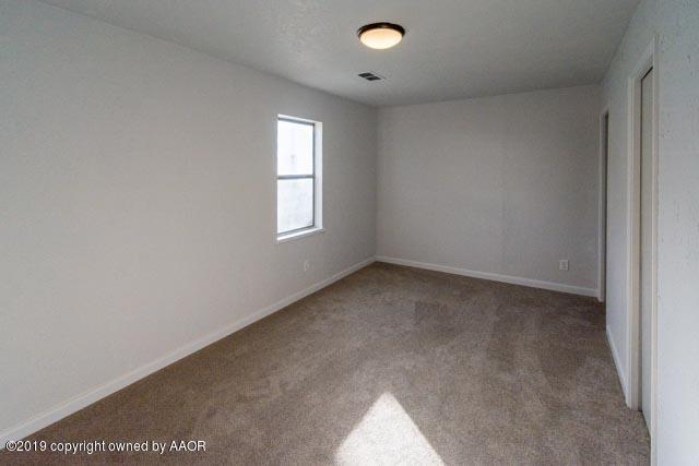 4435 Bowie Street Amarillo, TX 79110 - Photo 14 of 17 an empty room with a window