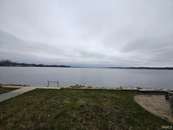 a view of a lake from a yard
