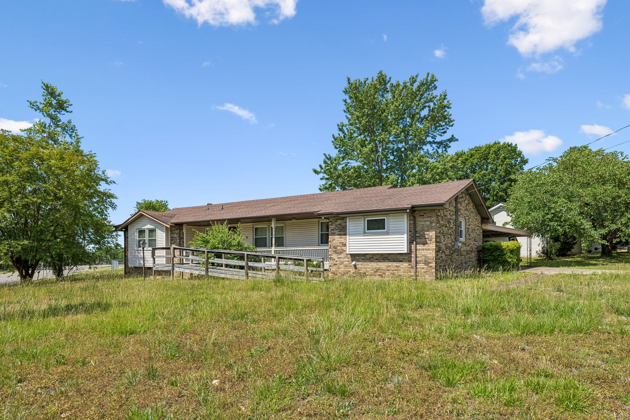 1246 Apache Lane Madison, TN 37115 - Photo 1 of 21 a house view with a garden space