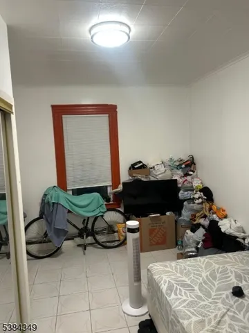 a room with furniture and gym equipment