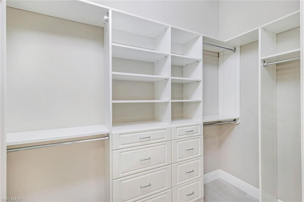 16378 Viansa Way, Unit 301 Naples, FL 34110 - Photo 12 of 32 Built out Primary Closet