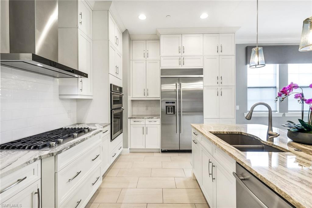 16378 Viansa Way, Unit 301 Naples, FL 34110 - Photo 8 of 32 Gas cooking built in fridge