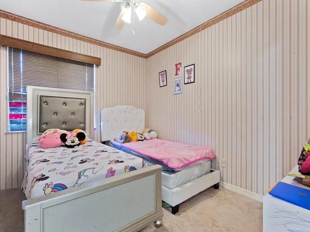 a view of a lake with a house in the background