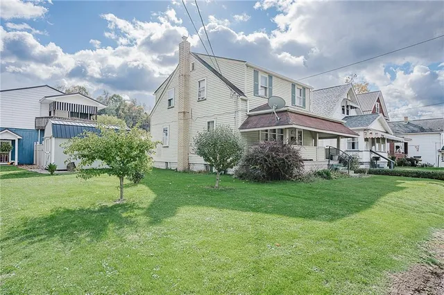 a house view with a garden space