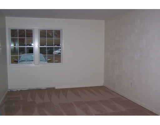 48 Donna Road Bellingham, MA 02019 - Photo 6 of 6 a view of an empty room with a window