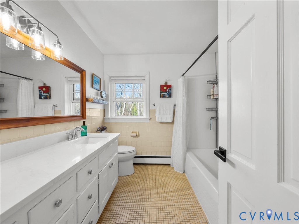 8636 Trabue Road Richmond, VA 23235 - Photo 31 of 50 Hall bath features new vanity top, faucet fixtures