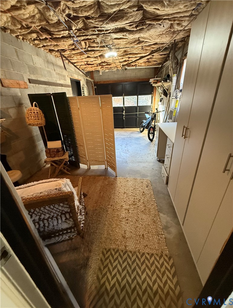 8636 Trabue Road Richmond, VA 23235 - Photo 41 of 50 Unfinished Garage with workshop and built in desk