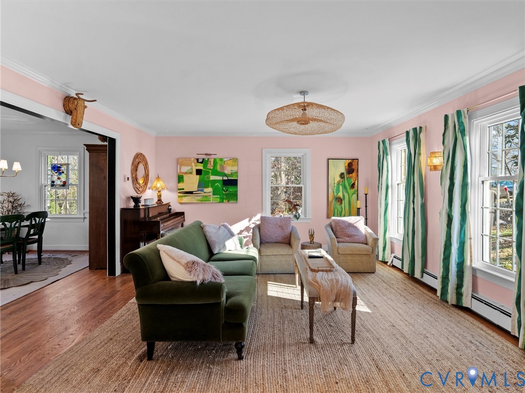 8636 Trabue Road Richmond, VA 23235 - Photo 5 of 50 The spacious and sunny living room welcomes all wh
