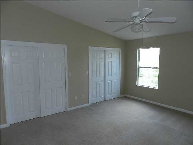 504 Keystone Road, Unit 504 Mary Esther, FL 32569 - Photo 7 of 20 an empty room with a window and a fan