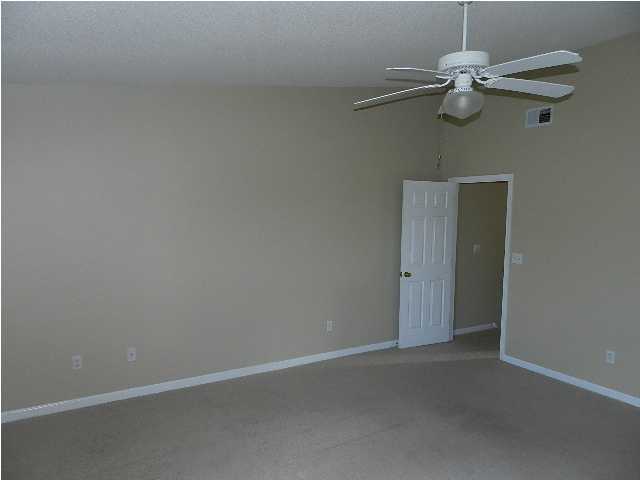 504 Keystone Road, Unit 504 Mary Esther, FL 32569 - Photo 9 of 20 a view of a small space with a fan
