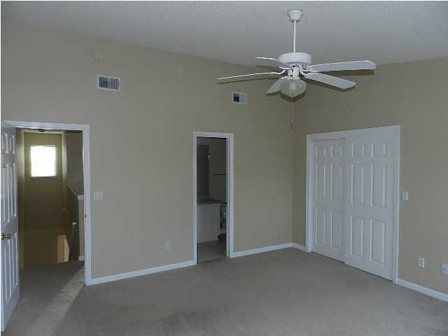 504 Keystone Road, Unit 504 Mary Esther, FL 32569 - Photo 10 of 20 a view of an empty room with a chandelier fan