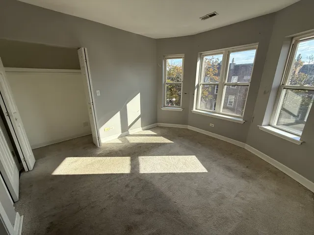 an empty room with windows