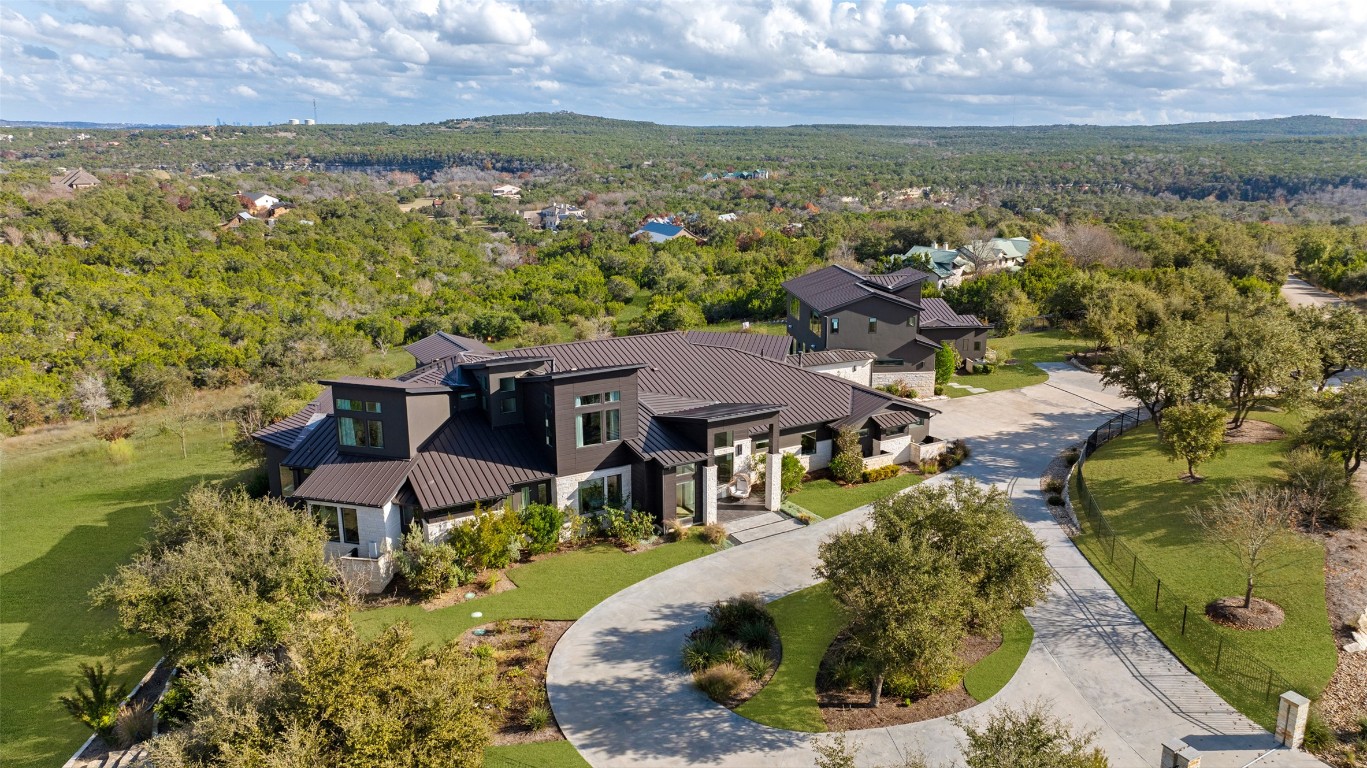 11805 Overlook Pass Austin, TX 78738 - Photo 1 of 40 an aerial view of a house with a lake view