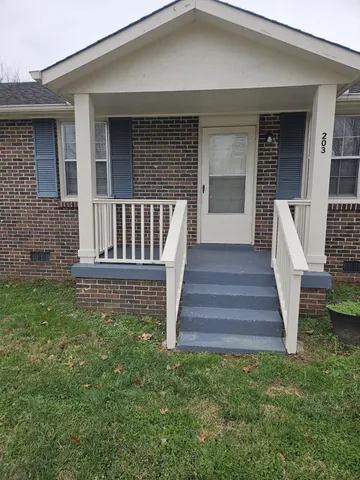a view of entryway with a front door