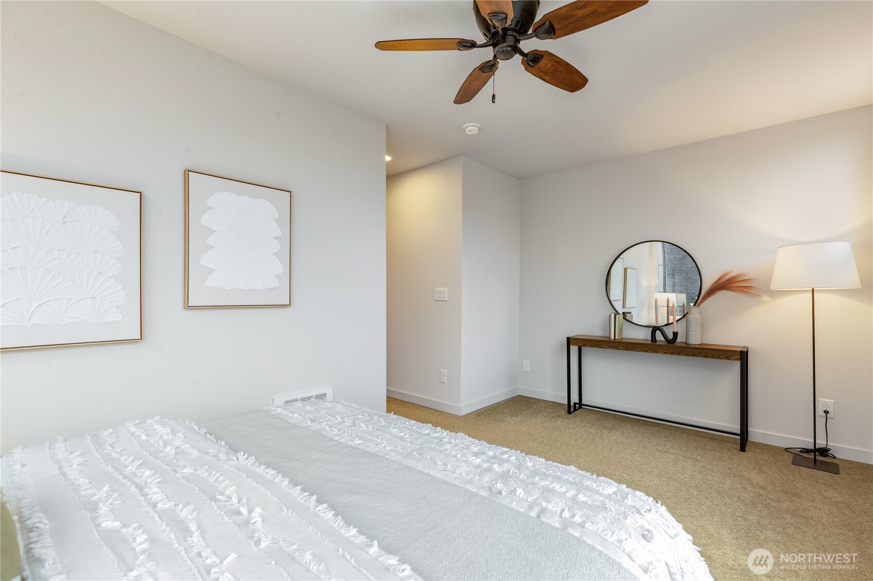 4272 Southwest Bradford Street Seattle, WA 98116 - Photo 21 of 28 a bedroom with a bed and a window