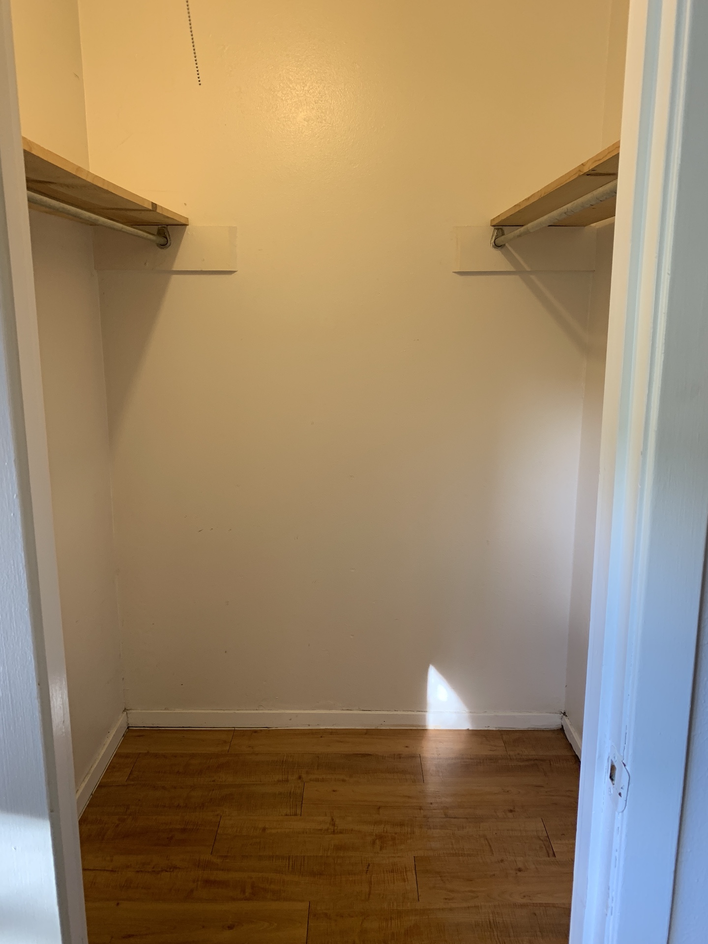 10810 Newmont Road, Unit 3 Austin, TX 78758 - Photo 8 of 8 Walk in closet with hardwood / wood-style floors