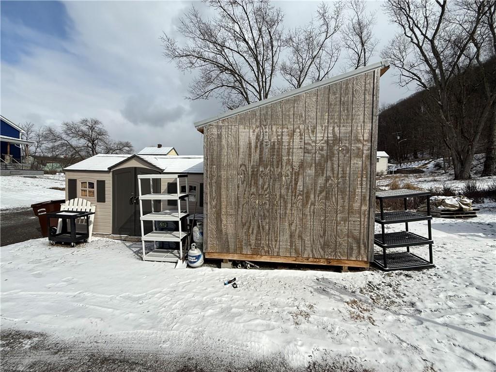 4111 Wildcat Road New Kensington, PA 15068 - Photo 20 of 21 a view of a house with a yard and sitting area