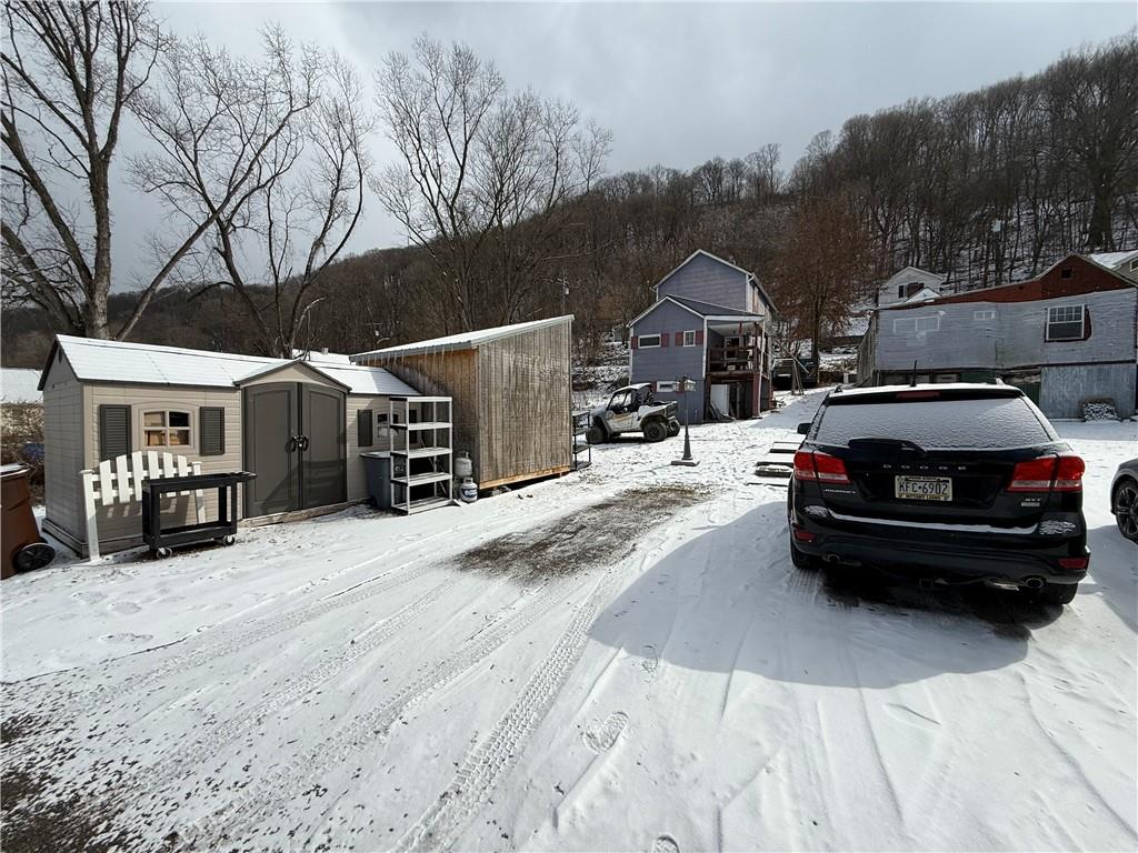 4111 Wildcat Road New Kensington, PA 15068 - Photo 21 of 21 a car parked in front of house