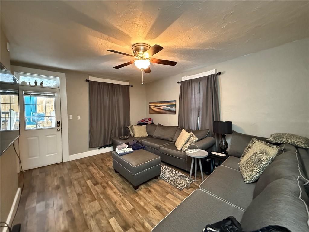 4111 Wildcat Road New Kensington, PA 15068 - Photo 6 of 21 a living room with furniture and wooden floor
