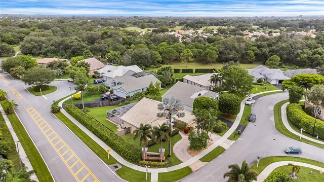 an aerial view of a house with a garden
