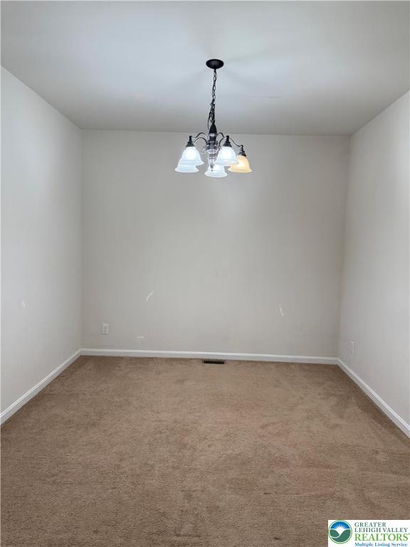 1805 Hemming Way Orefield, PA 18069 - Photo 16 of 24 a picture of a room with a mirror and tiles