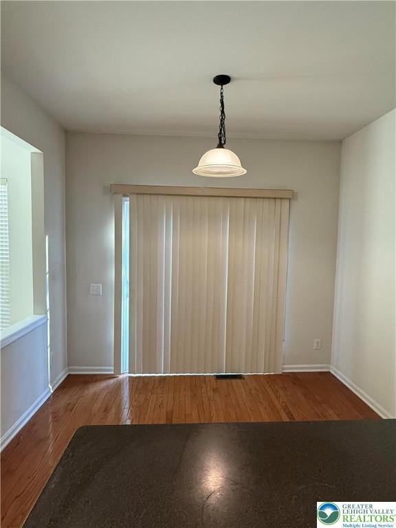 1805 Hemming Way Orefield, PA 18069 - Photo 5 of 24 a view of empty room with wooden floor