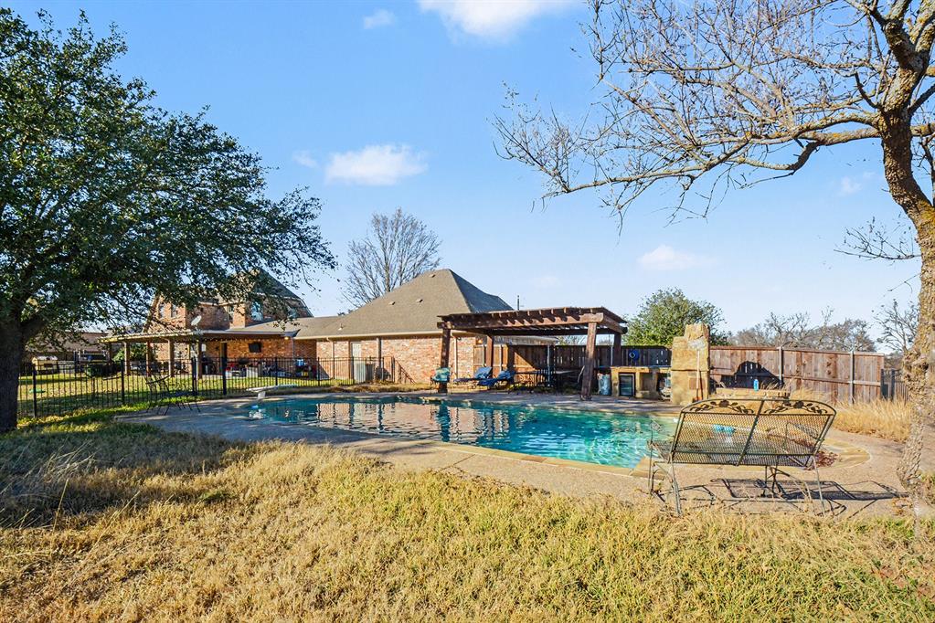 2474 McConnell Road Gunter, TX 75058 - Photo 15 of 17 a house view with a garden space