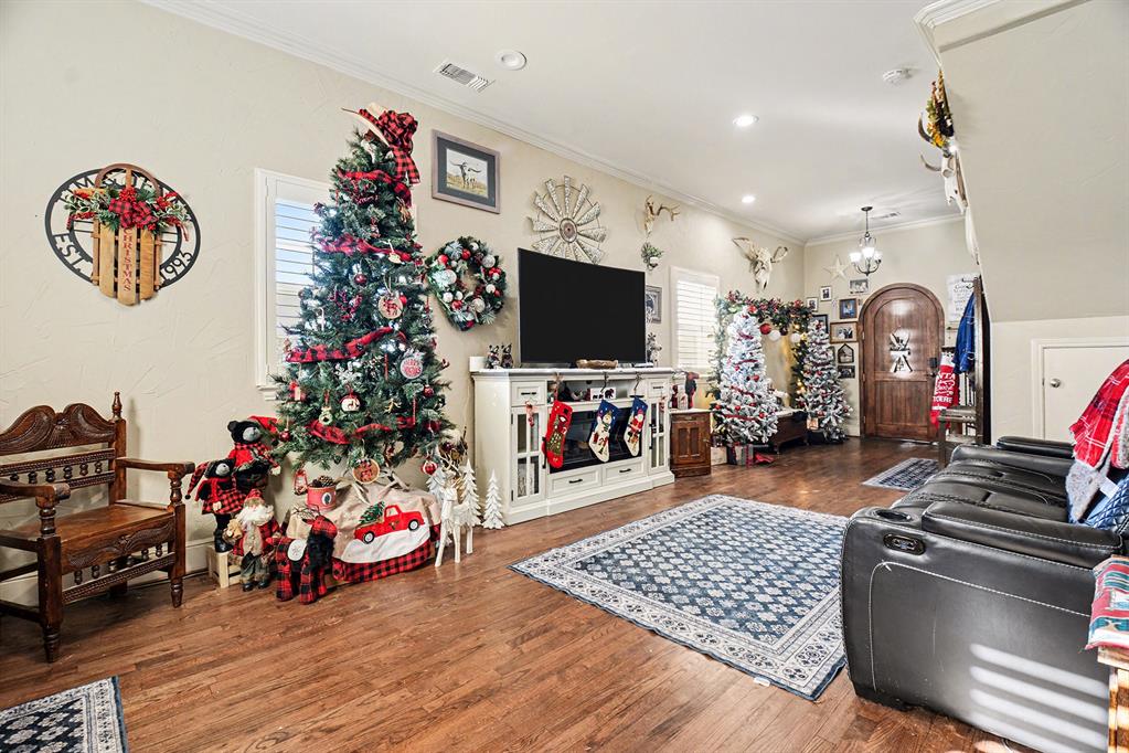 2474 McConnell Road Gunter, TX 75058 - Photo 2 of 17 a room with toys and wooden floor