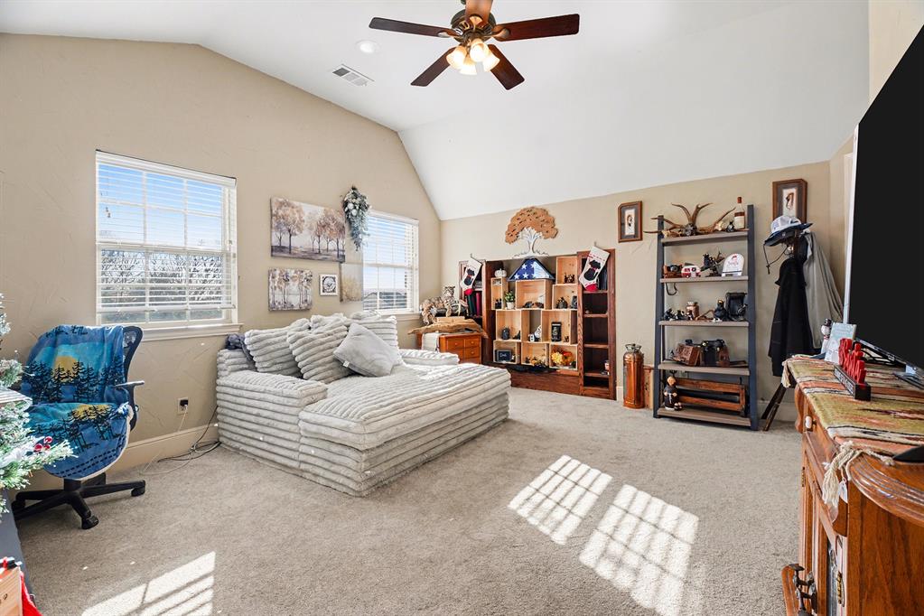 2474 McConnell Road Gunter, TX 75058 - Photo 7 of 17 a bedroom with bed and a window