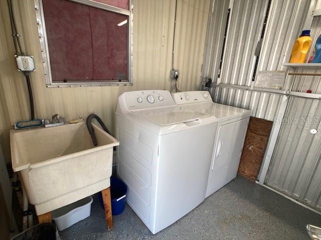 1710 7th Street Southwest, Unit 24 Ruskin, FL 33570 - Photo 33 of 44 a utility room with dryer and washer