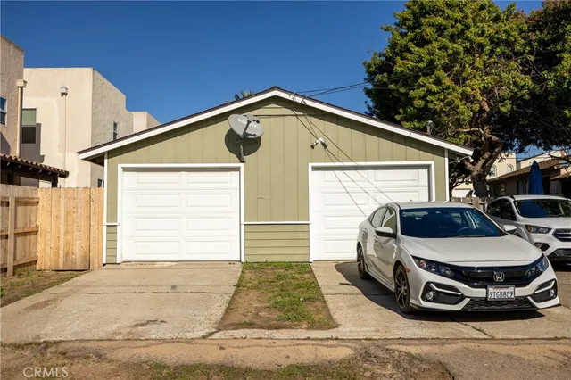 a view of a car in front of a house