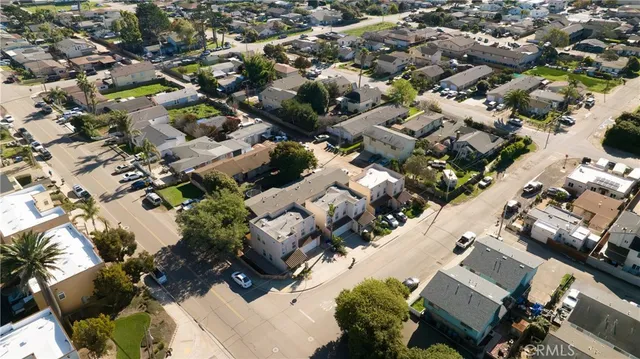 an aerial view of a city with lots of residential buildings